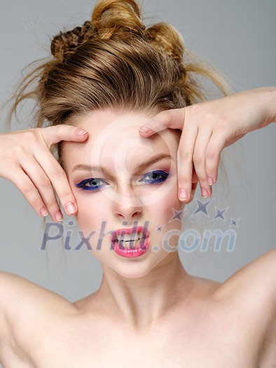 Expressive young women. Girl with make-up and hairstyle with expressive emotion. Expressive young women. Girl with make-up and hairstyle with expressive emotion.