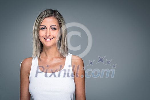 Gorgeous young woman smiling, looking happy Gorgeous young woman smiling, looking happy