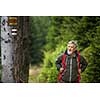 Active senior hiking in high mountains