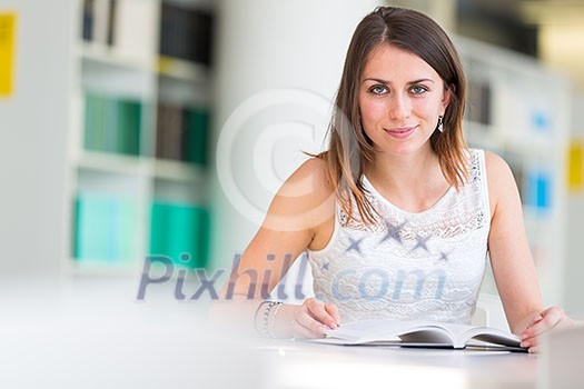 Pretty young college student in a library (shallow DOF; color toned image) Pretty young college student in a library (shallow DOF; color toned image)