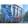 European union flag against parliament in Brussels, Belgium