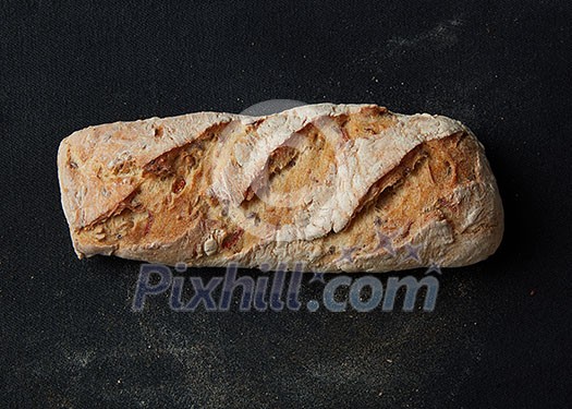 Healthy bread with seeds isolated on black background. Healthy bread with seeds isolated on black background.