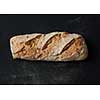 Healthy bread with seeds isolated on black background.