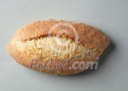 one loaf of bread close-up on a light background
