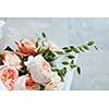 Closeup of bouquet of roses for giving as gift or present. Bouquet of roses represented over white background. Woman's Day concept.