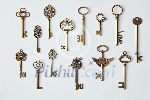 Ornamental medieval vintage keys with intricate forging, composed of fleur-de-lis elements, victorian leaf scrolls and heart shaped swirls. Ornamental medieval vintage keys with intricate forging, composed of fleur-de-lis elements, victorian leaf scrolls and heart shaped swirls.