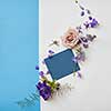 Copy space of navy blue poster may be used for expressing positive emotions. Poster is designed with help of flowers and two backgrounds: white and turquois.