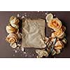 Blank craft paper with flowers around, copy space