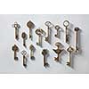 Vintage or antique door keys on white paper