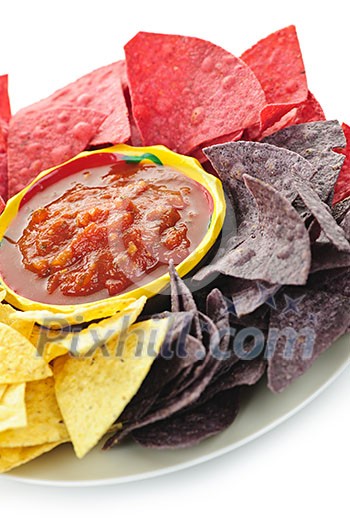 Bowl of salsa with colorful tortilla chips Bowl of salsa with colorful tortilla chips
