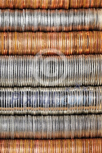 Background of penny nickel dime and quarter stacked coins Background of penny nickel dime and quarter stacked coins