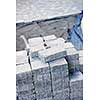 Stacks of interlocking stones for installing driveway landscaping