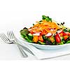 Plate of healthy green garden salad with fresh vegetables