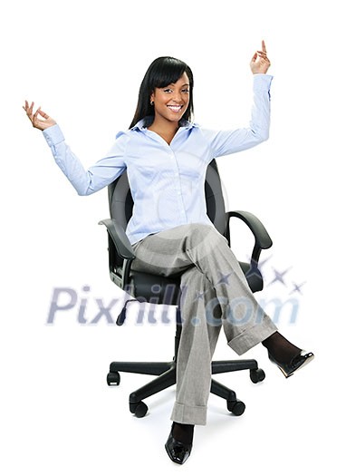 Young excited black businesswoman sitting in leather office chair Young excited black businesswoman sitting in leather office chair