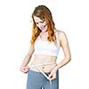 Happy fit young woman measuring waist with tape isolated on white
