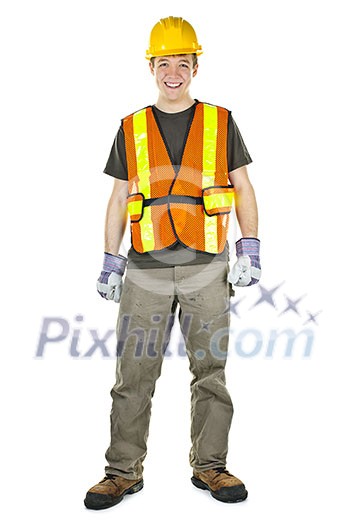 Happy male construction worker standing in safety vest and hard hat Happy male construction worker standing in safety vest and hard hat
