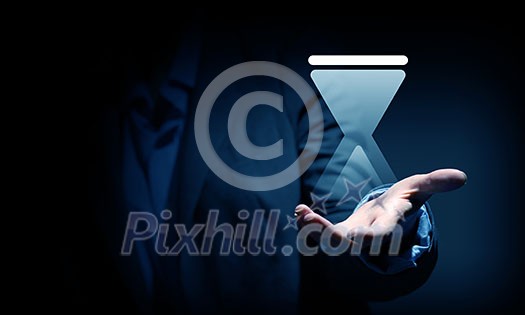 Close up of businesswoman hand holding digital icon in palm Close up of businesswoman hand holding digital icon in palm