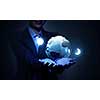 Close view of businessman showing digital Earth planet