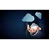 Close view of businessman showing cloud icons in palm