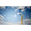 Imaginary image of ladder leading to square door in sky