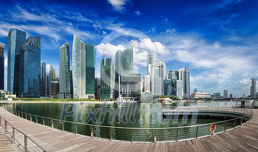 Singapore skyline of business district and Marina Bay panorama. Ultra wide angle Singapore skyline of business district and Marina Bay panorama. Ultra wide angle