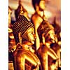 Vintage retro effect filtered hipster style image of golden Buddha statues in buddhist temple Wat Saket (The Golden Mount), Bangkok, Thailand