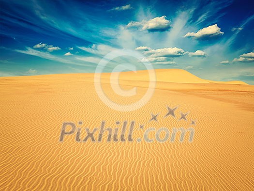 Vintage retro effect filtered hipster style image of white sand dunes on sunrise, Mui Ne, Vietnam Vintage retro effect filtered hipster style image of white sand dunes on sunrise, Mui Ne, Vietnam