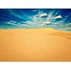 Vintage retro effect filtered hipster style image of white sand dunes on sunrise, Mui Ne, Vietnam