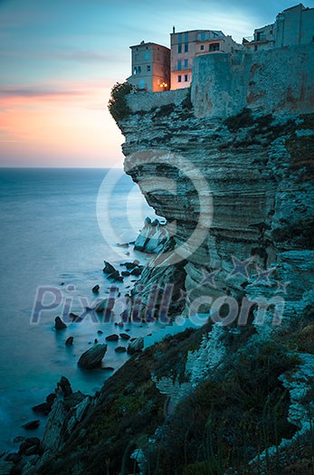 Sunset over the Old Town of Bonifacio, the limestone cliff, South Coast of Corsica Island, France Sunset over the Old Town of Bonifacio, the limestone cliff, South Coast of Corsica Island, France