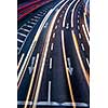 Motion blurred city road traffic (color toned  image)