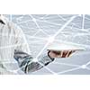 Businessman hand holding virtual panel representing net connection