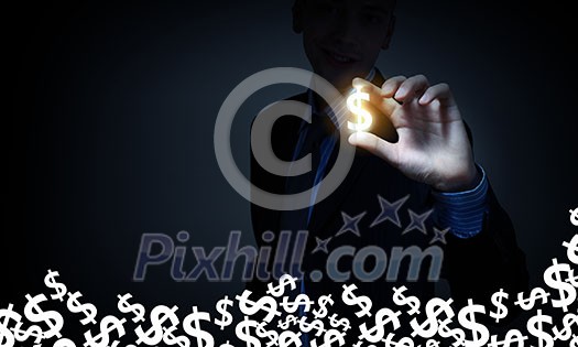 Close up of businessman taking dollar symbol with fingers Close up of businessman taking dollar symbol with fingers