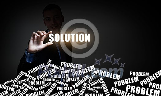 Businessman take with fingers glowing solution word on screen Businessman take with fingers glowing solution word on screen