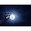 Hand of man taking with fingers digital power icon
