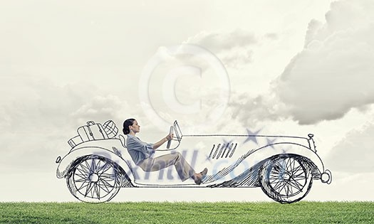 Young humorous woman driving drawn funny car Young humorous woman driving drawn funny car