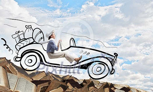 Young humorous woman driving drawn funny car Young humorous woman driving drawn funny car