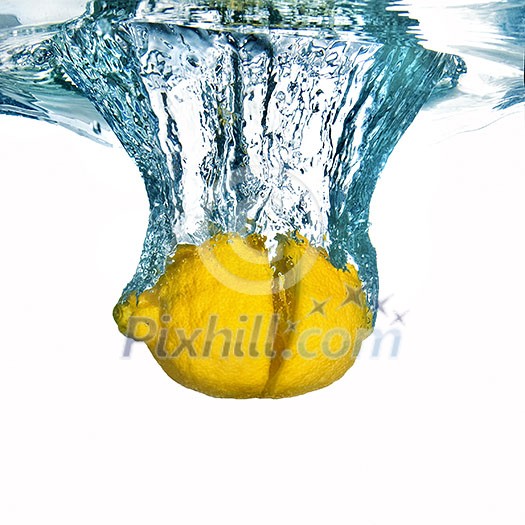 Fresh lemon dropped into water with bubbles isolated on white Fresh lemon dropped into water with bubbles isolated on white