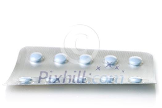 pack of blue tablets isolated on white pack of blue tablets isolated on white