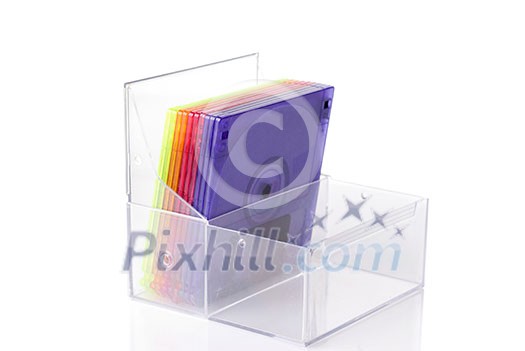 Color floppy disks in box isolated on white Color floppy disks in box isolated on white