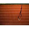 Shot of a young male athlete training on a race track. Sprinter running on athletics tracks seen from above