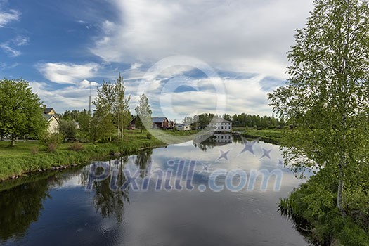 Calm river scenery in nordic countryside