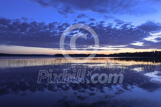 Colorful lake scenery in summer night Colorful lake scenery in summer night