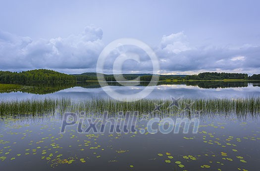 Calm lake scenery after rain Calm lake scenery after rain