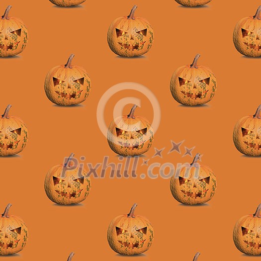 pattern of halloween pumpkins on an orange background pattern of halloween pumpkins on an orange background
