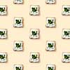 pattern sandwiches with butter and parsley on a beige background flat lay