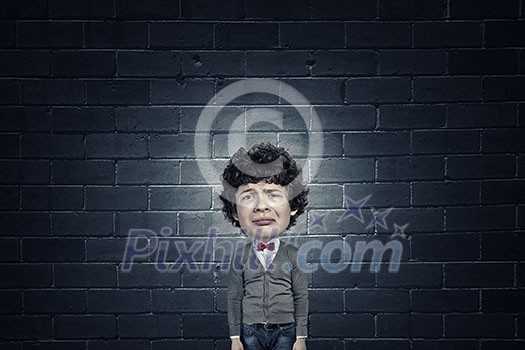 Young man with big head thinking about something Young man with big head thinking about something