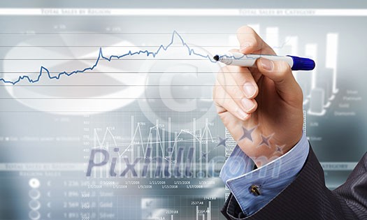 Close up of businessman drawing increasing graph with marker on media screen Close up of businessman drawing increasing graph with marker on media screen