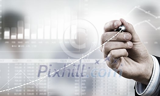 Close up of businessman drawing increasing graph with marker on media screen Close up of businessman drawing increasing graph with marker on media screen