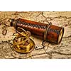 Travel geography navigation concept background - old vintage retro compass with sundial and spyglass on ancient world map