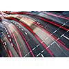 Motion blurred city road traffic (color toned  image)